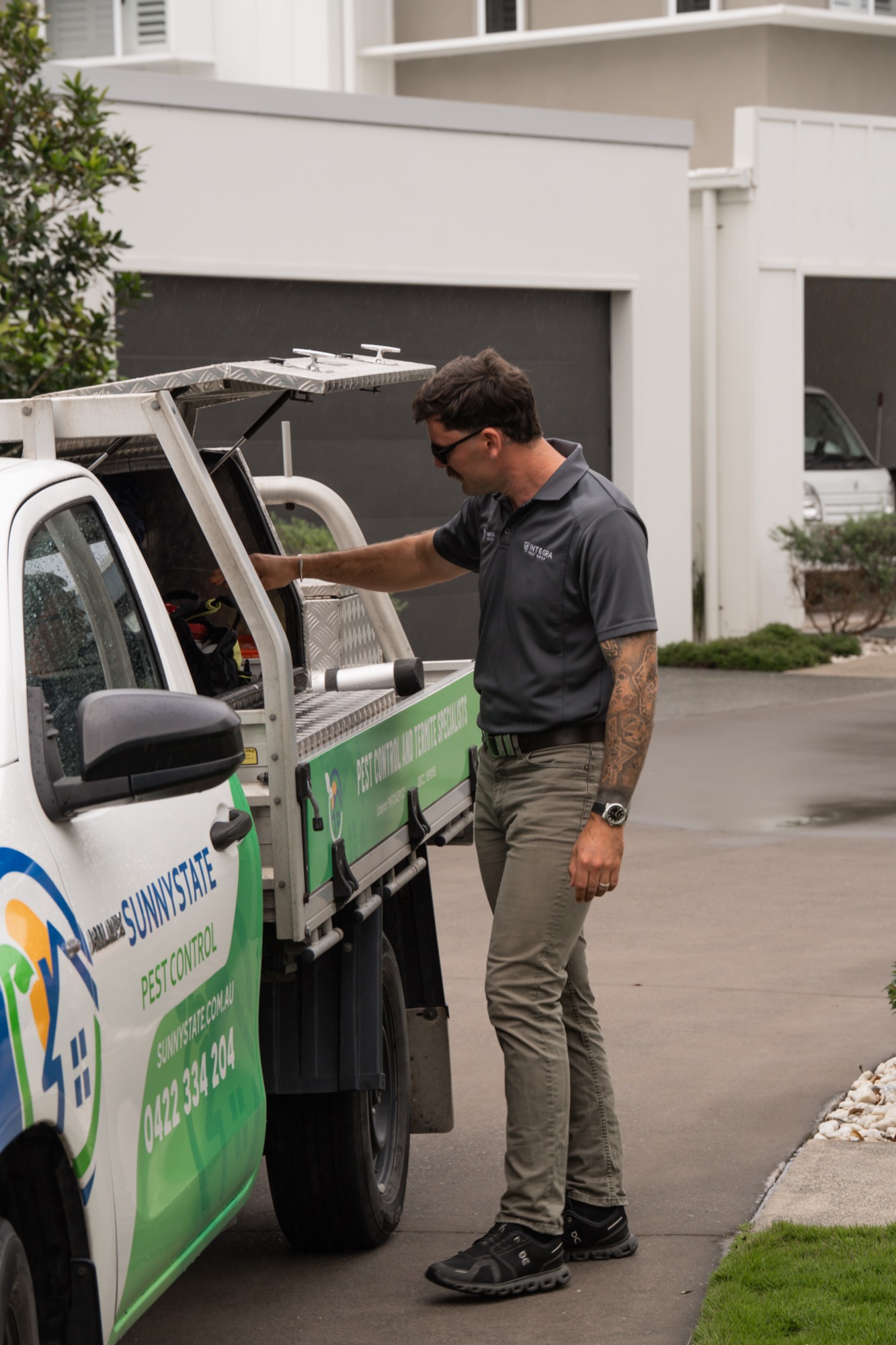 Sunnystate technician accessing equipment from ute