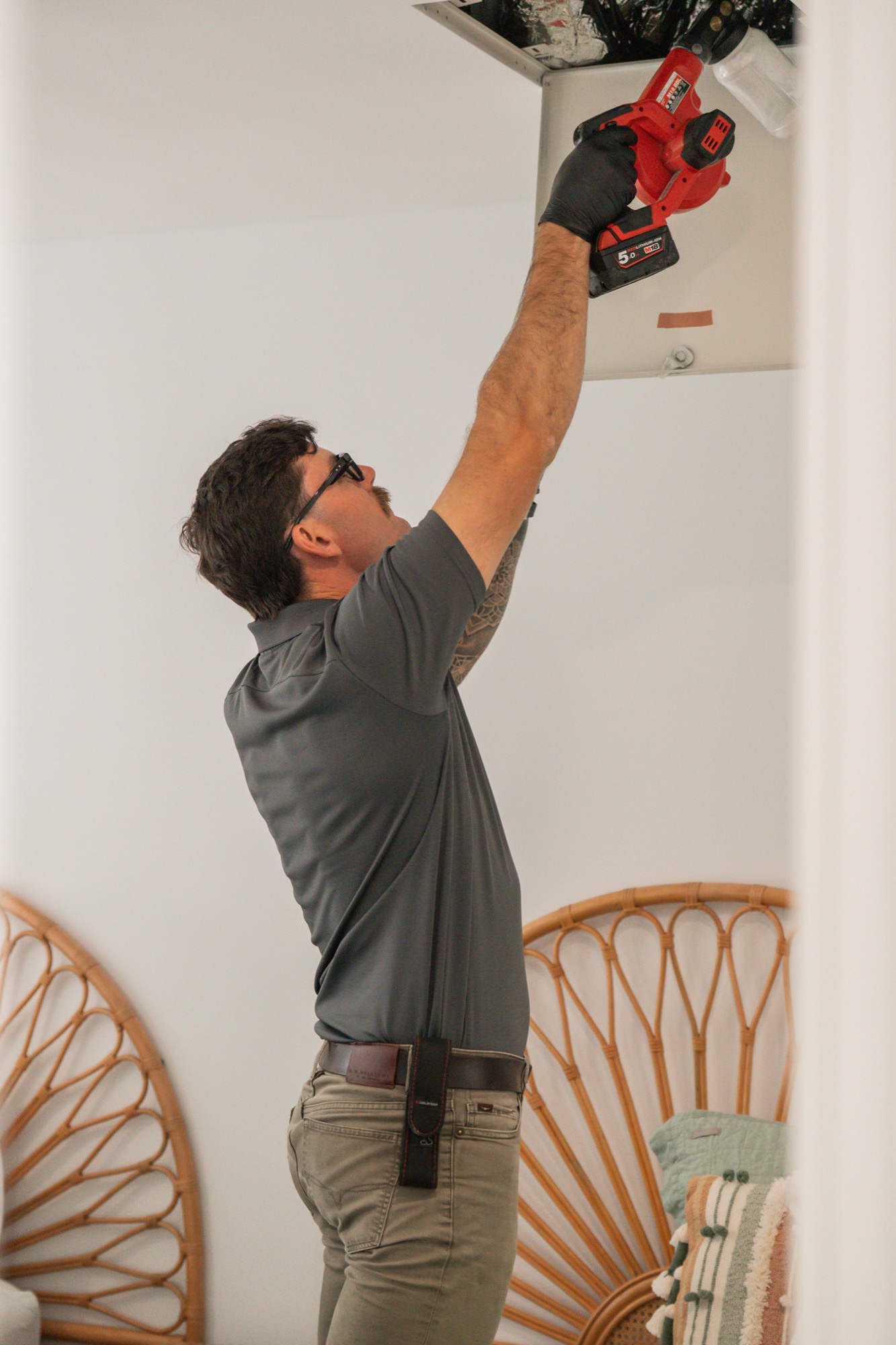 Sunnystate technician treating roof void — standard on all accessible roof spaces