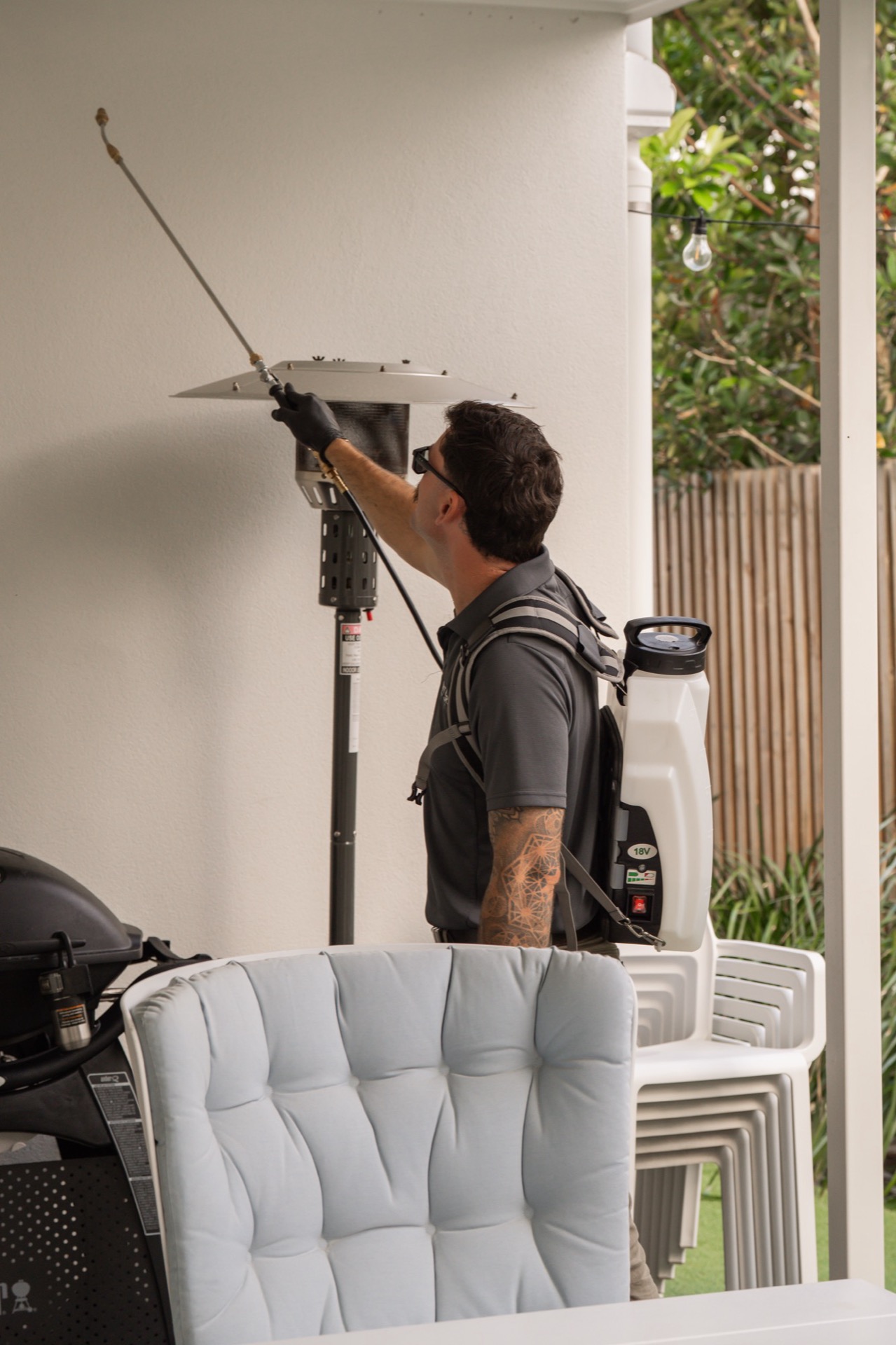 Sunnystate technician treating eaves and exterior perimeter