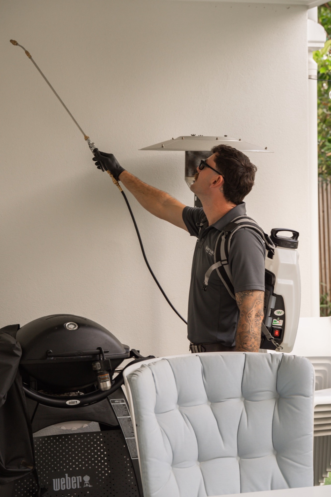Sunnystate technician treating eaves for spider webbing and harbouring areas